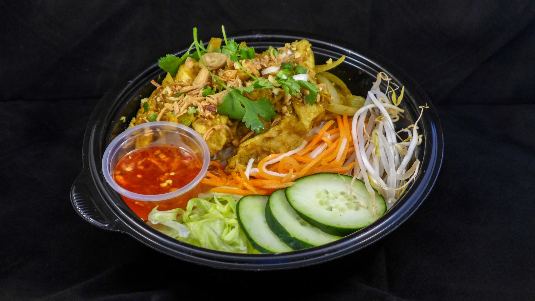 Bún rice noodle salad bowl with fried spring roll